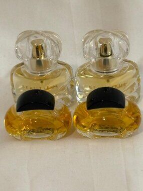 4 sample size perfume. 2 each Anne Kline & Beautiful Belle